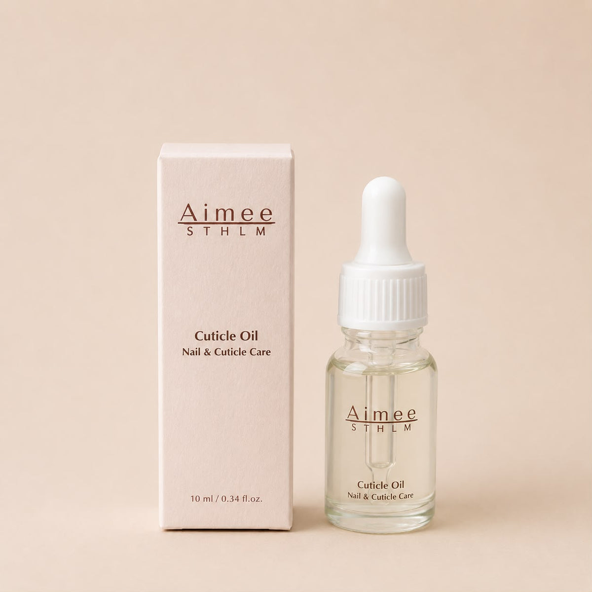 Aimee STHLM Nagelöl – Pflegendes Nagelhautöl in einer Tropfflasche mit Verpackung